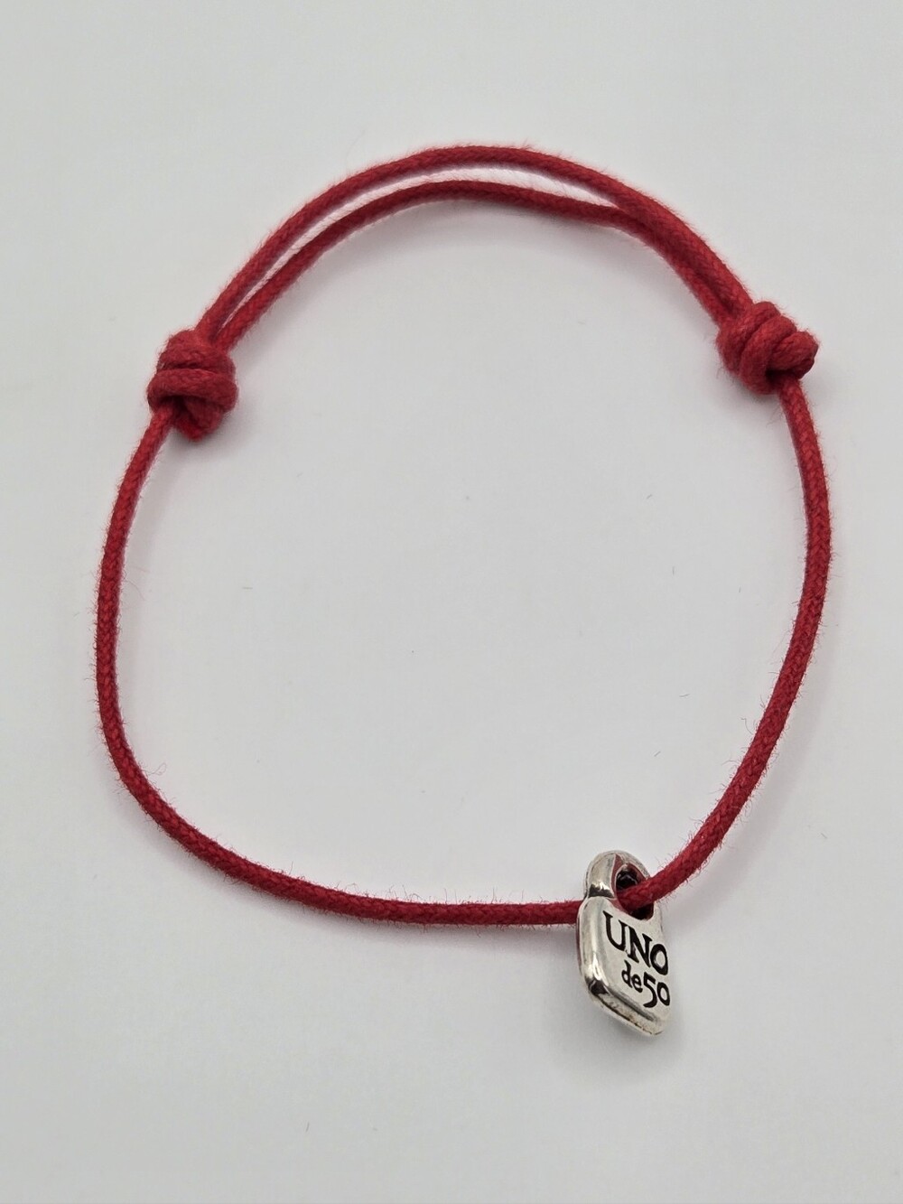 UNO de 50 Adjustable Red Cord Bracelet with Silver UNO Charm